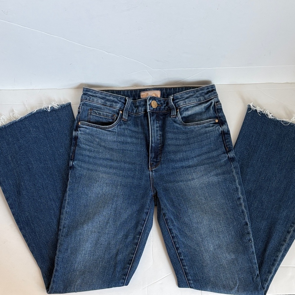 Kut from the Kloth Ana Fab Ab Super Flare 5-pocket blue jean cut raw hem